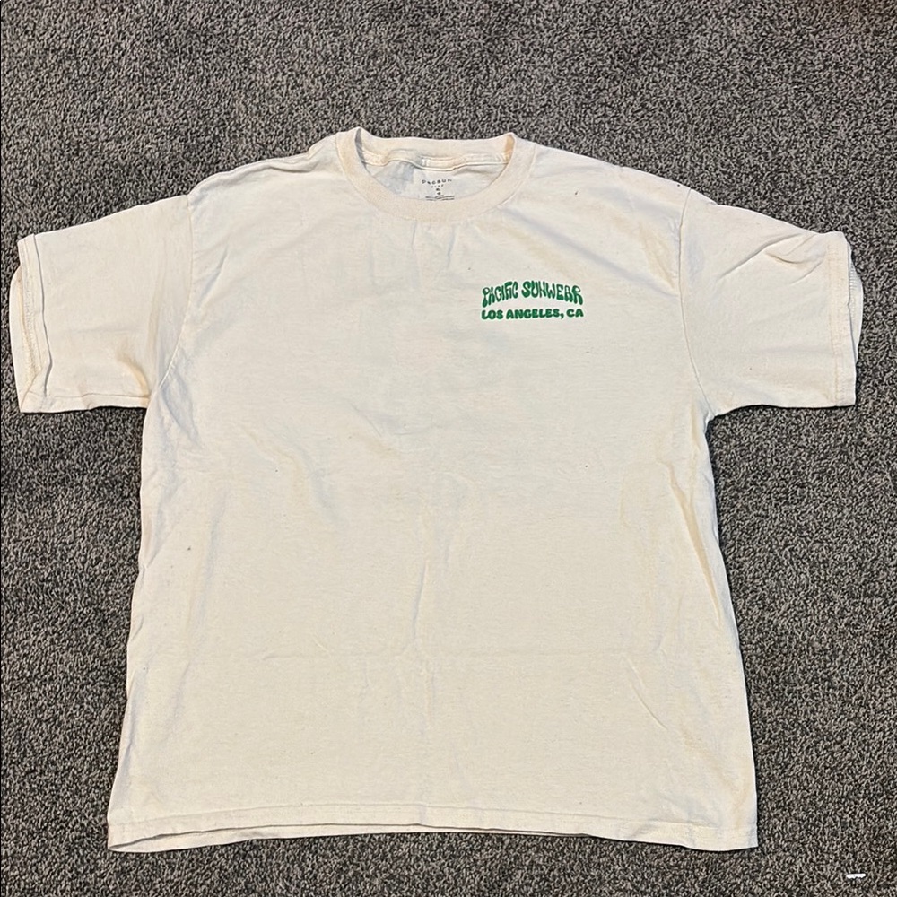 Beige PacSun kids Pacific Sunwear (floral design on the back) Shirt LA, CA